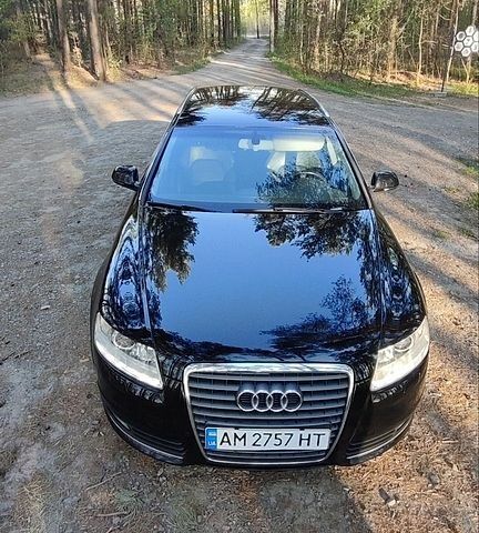 Чорний Ауді А6, об'ємом двигуна 2 л та пробігом 235 тис. км за 9800 $, фото 1 на Automoto.ua