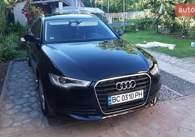 Черный Ауди А6, объемом двигателя 2 л и пробегом 283 тыс. км за 14599 $, фото 1 на Automoto.ua