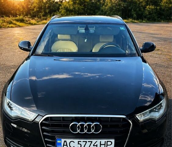 Чорний Ауді А6, об'ємом двигуна 2 л та пробігом 289 тис. км за 12832 $, фото 1 на Automoto.ua