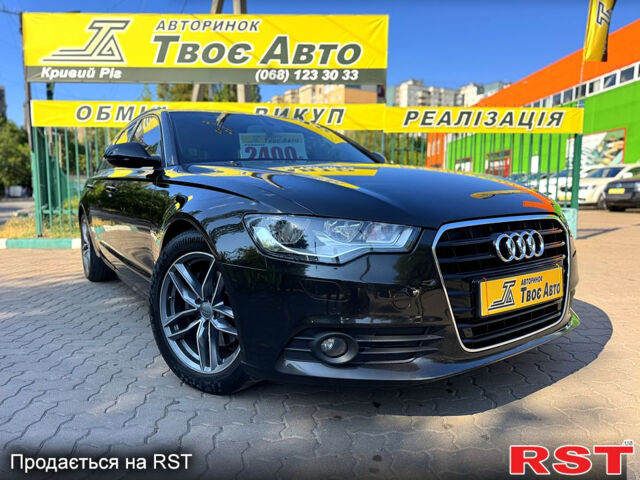 Черный Ауди А6, объемом двигателя 2 л и пробегом 298 тыс. км за 13300 $, фото 1 на Automoto.ua