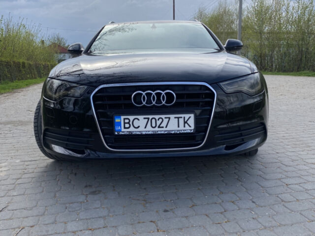 Черный Ауди А6, объемом двигателя 2 л и пробегом 260 тыс. км за 15700 $, фото 1 на Automoto.ua