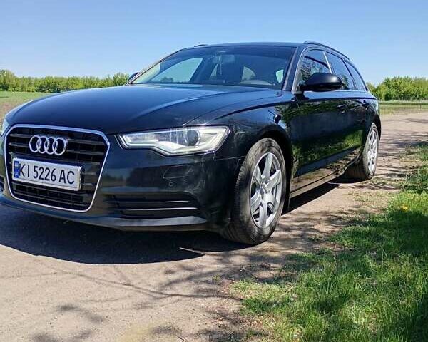 Черный Ауди А6, объемом двигателя 2 л и пробегом 305 тыс. км за 15000 $, фото 1 на Automoto.ua