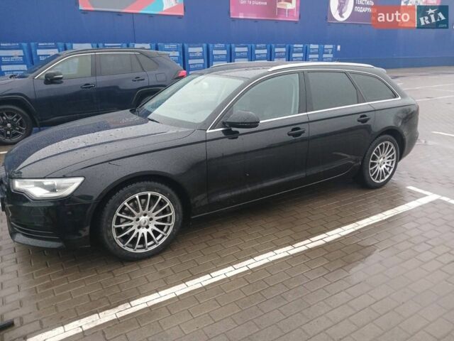 Черный Ауди А6, объемом двигателя 2 л и пробегом 312 тыс. км за 15000 $, фото 1 на Automoto.ua