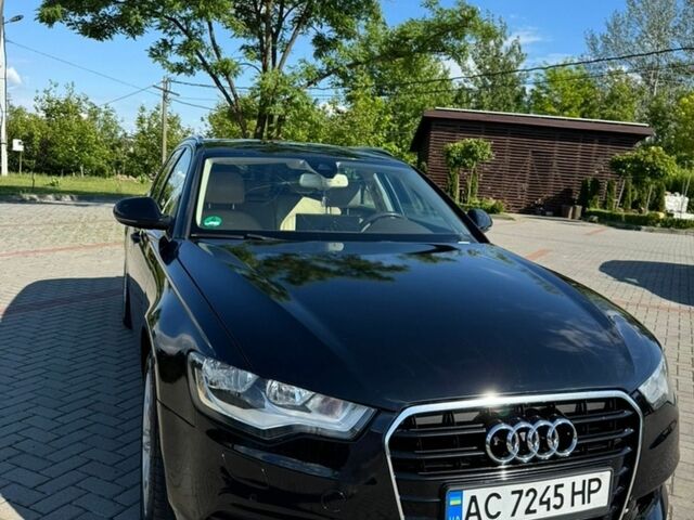 Черный Ауди А6, объемом двигателя 2 л и пробегом 312 тыс. км за 13500 $, фото 1 на Automoto.ua