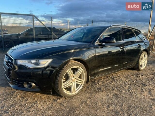 Черный Ауди А6, объемом двигателя 1.97 л и пробегом 241 тыс. км за 15500 $, фото 1 на Automoto.ua