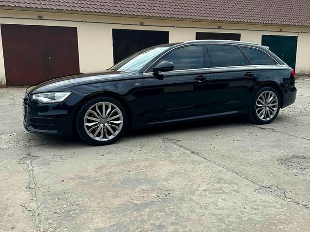 Черный Ауди А6, объемом двигателя 2 л и пробегом 250 тыс. км за 15500 $, фото 1 на Automoto.ua