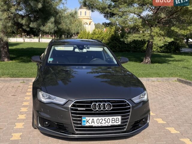 Черный Ауди А6, объемом двигателя 3 л и пробегом 205 тыс. км за 21500 $, фото 1 на Automoto.ua