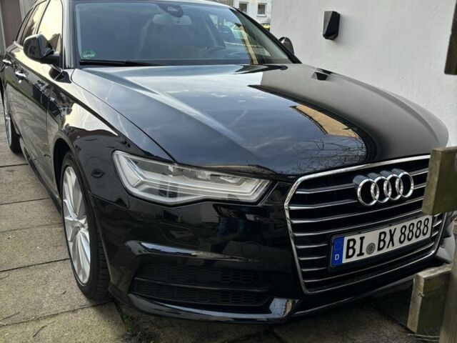 Чорний Ауді А6, об'ємом двигуна 2 л та пробігом 207 тис. км за 23824 $, фото 1 на Automoto.ua