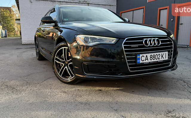 Черный Ауди А6, объемом двигателя 3 л и пробегом 138 тыс. км за 23500 $, фото 1 на Automoto.ua