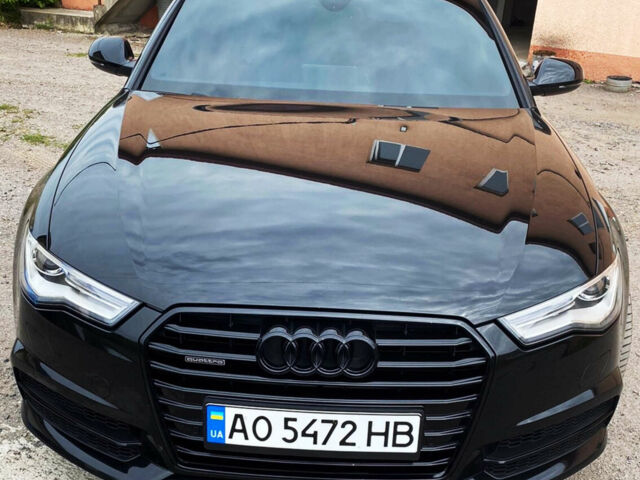 Черный Ауди А6, объемом двигателя 2 л и пробегом 230 тыс. км за 26000 $, фото 1 на Automoto.ua