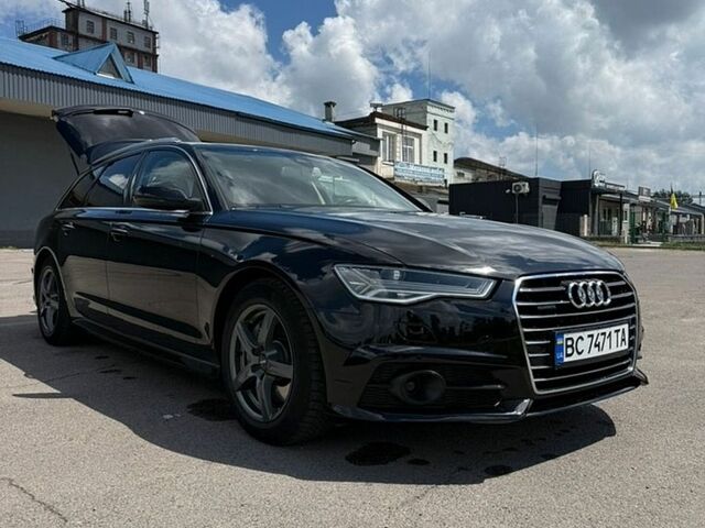 Черный Ауди А6, объемом двигателя 2.97 л и пробегом 219 тыс. км за 22200 $, фото 1 на Automoto.ua
