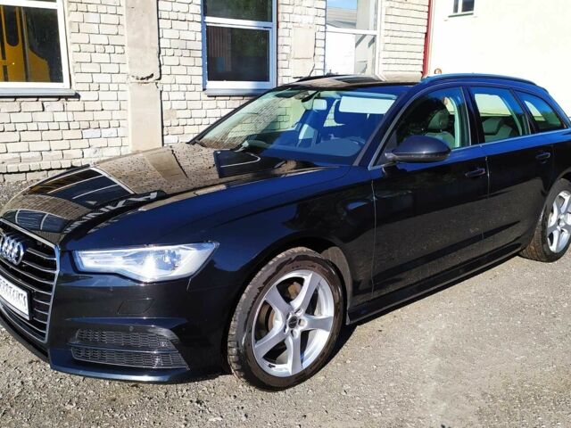 Черный Ауди А6, объемом двигателя 2 л и пробегом 170 тыс. км за 19990 $, фото 1 на Automoto.ua