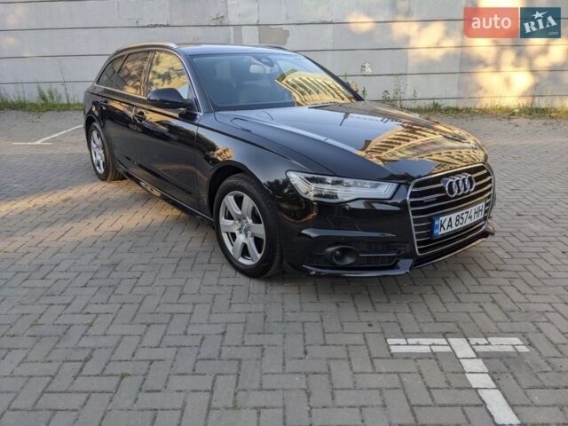 Черный Ауди А6, объемом двигателя 1.97 л и пробегом 241 тыс. км за 18000 $, фото 1 на Automoto.ua