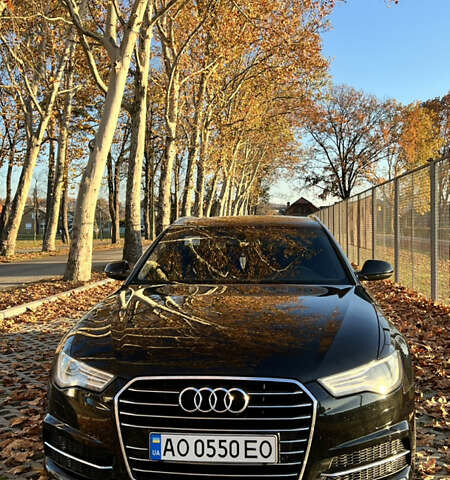 Черный Ауди А6, объемом двигателя 2 л и пробегом 243 тыс. км за 18000 $, фото 1 на Automoto.ua