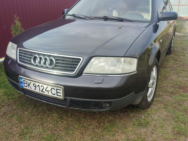 Фиолетовый Ауди А6, объемом двигателя 2 л и пробегом 370 тыс. км за 3500 $, фото 1 на Automoto.ua