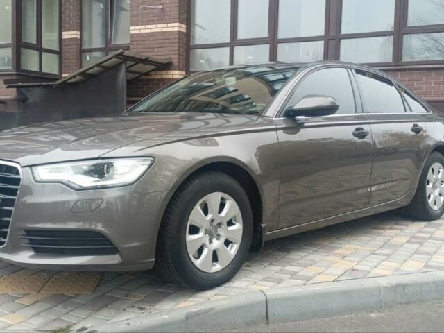 Коричневый Ауди А6, объемом двигателя 2 л и пробегом 95 тыс. км за 15600 $, фото 1 на Automoto.ua