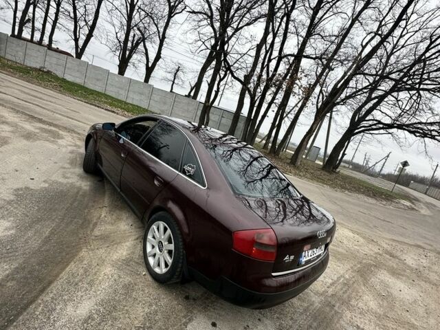 Красный Ауди А6, объемом двигателя 2.8 л и пробегом 330 тыс. км за 3650 $, фото 1 на Automoto.ua