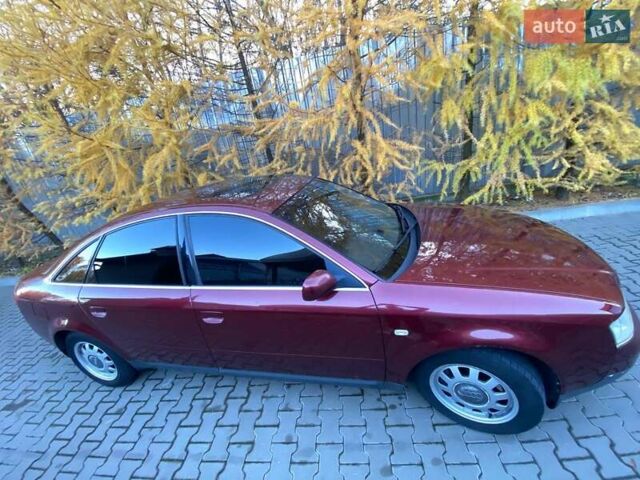 Красный Ауди А6, объемом двигателя 2.4 л и пробегом 280 тыс. км за 5200 $, фото 1 на Automoto.ua