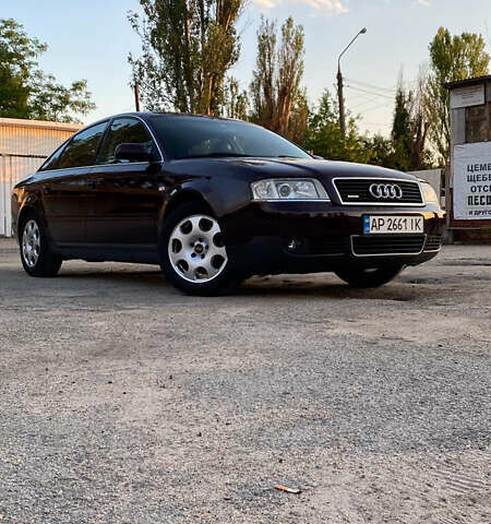 Красный Ауди А6, объемом двигателя 2.4 л и пробегом 361 тыс. км за 5600 $, фото 1 на Automoto.ua