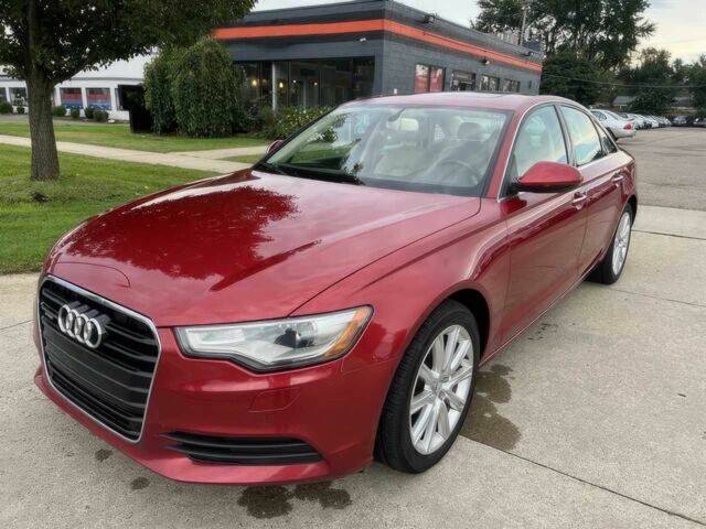 Червоний Ауді А6, об'ємом двигуна 2 л та пробігом 75 тис. км за 12600 $, фото 1 на Automoto.ua