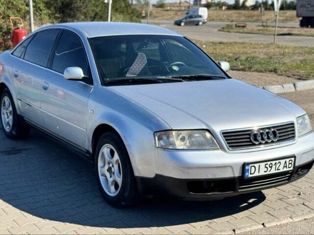 Серый Ауди А6, объемом двигателя 2.5 л и пробегом 320 тыс. км за 1757 $, фото 1 на Automoto.ua