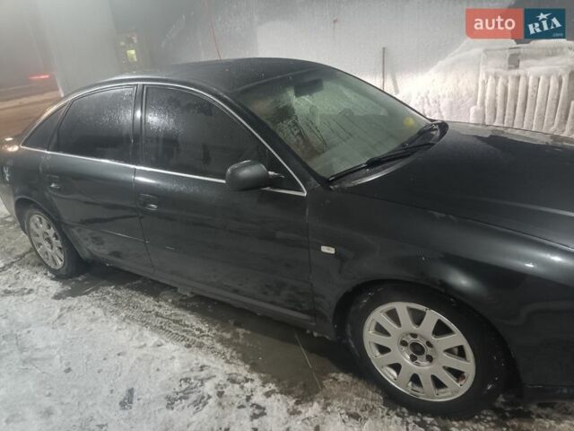 Серый Ауди А6, объемом двигателя 2.39 л и пробегом 300 тыс. км за 3800 $, фото 1 на Automoto.ua