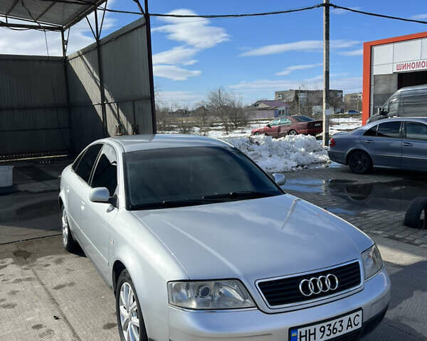 Серый Ауди А6, объемом двигателя 2.5 л и пробегом 296 тыс. км за 4000 $, фото 1 на Automoto.ua