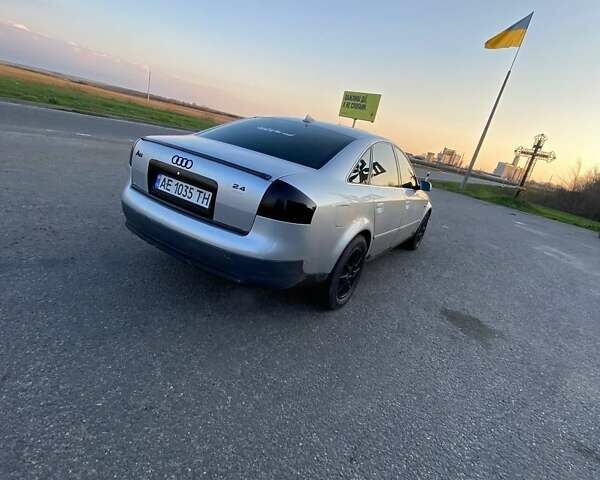 Серый Ауди А6, объемом двигателя 2.4 л и пробегом 300 тыс. км за 3700 $, фото 1 на Automoto.ua