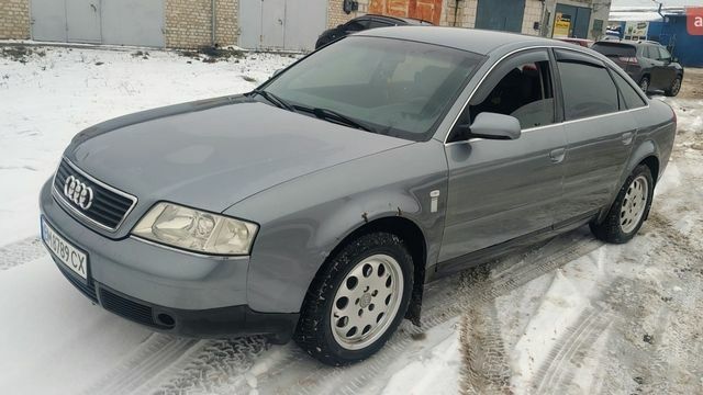 Серый Ауди А6, объемом двигателя 2.5 л и пробегом 400 тыс. км за 4000 $, фото 1 на Automoto.ua