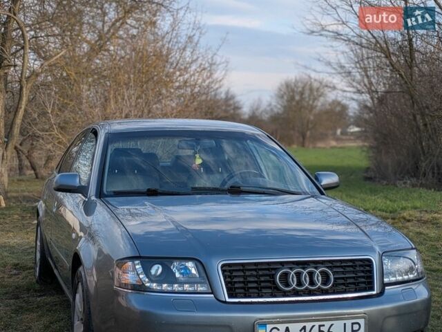 Серый Ауди А6, объемом двигателя 2.5 л и пробегом 251 тыс. км за 5500 $, фото 1 на Automoto.ua