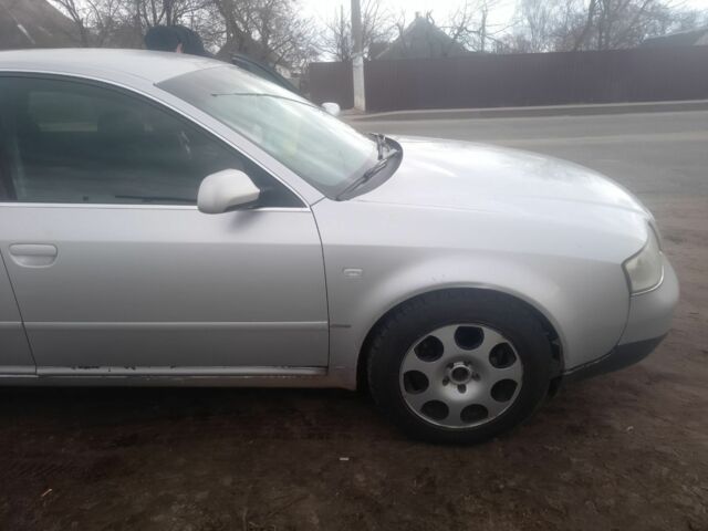 Сірий Ауді А6, об'ємом двигуна 2 л та пробігом 350 тис. км за 3299 $, фото 1 на Automoto.ua