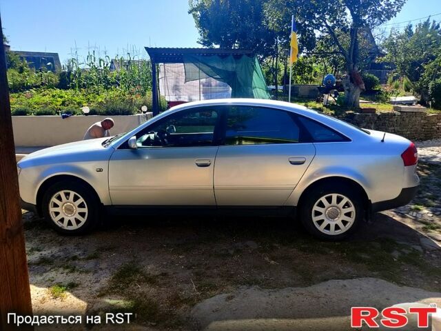 Серый Ауди А6, объемом двигателя 1.8 л и пробегом 428 тыс. км за 4400 $, фото 1 на Automoto.ua