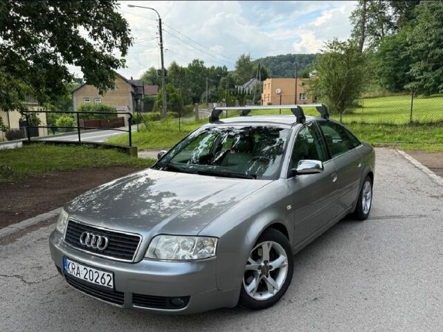 Сірий Ауді А6, об'ємом двигуна 2 л та пробігом 253 тис. км за 2400 $, фото 1 на Automoto.ua