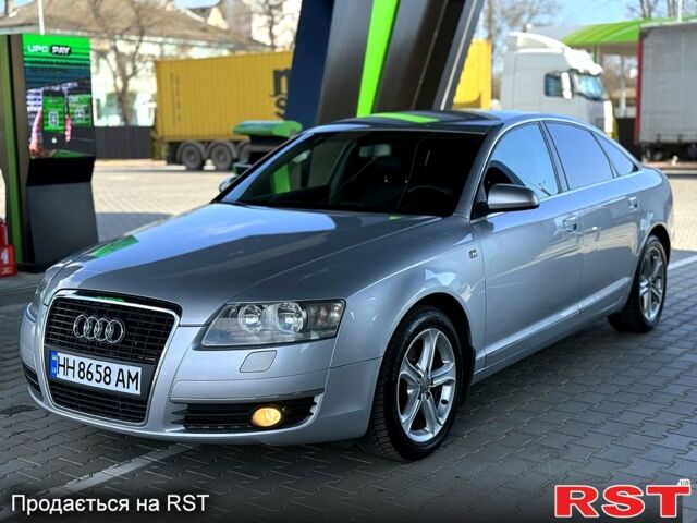 Серый Ауди А6, объемом двигателя 2.4 л и пробегом 255 тыс. км за 5900 $, фото 1 на Automoto.ua