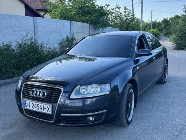 Серый Ауди А6, объемом двигателя 2.4 л и пробегом 239 тыс. км за 5500 $, фото 1 на Automoto.ua