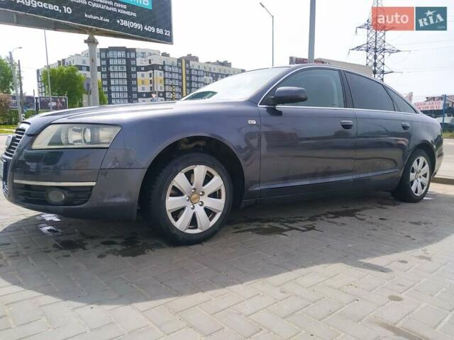 Серый Ауди А6, объемом двигателя 2 л и пробегом 315 тыс. км за 7100 $, фото 1 на Automoto.ua