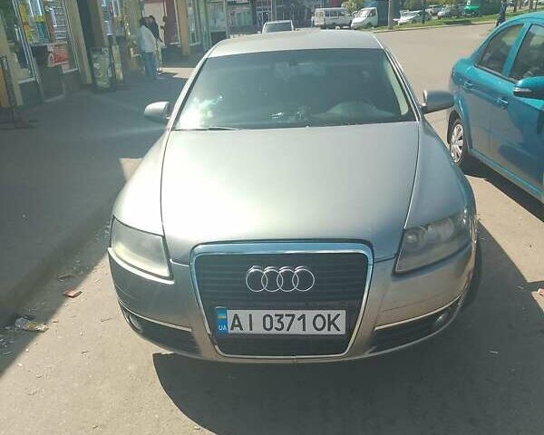 Серый Ауди А6, объемом двигателя 2.4 л и пробегом 322 тыс. км за 6500 $, фото 1 на Automoto.ua