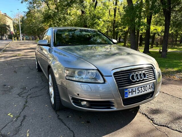 Серый Ауди А6, объемом двигателя 2 л и пробегом 313 тыс. км за 6300 $, фото 1 на Automoto.ua