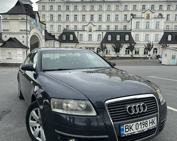 Серый Ауди А6, объемом двигателя 2.4 л и пробегом 270 тыс. км за 7400 $, фото 1 на Automoto.ua