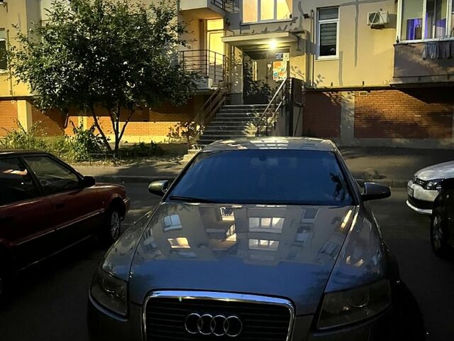 Серый Ауди А6, объемом двигателя 2 л и пробегом 312 тыс. км за 5600 $, фото 1 на Automoto.ua