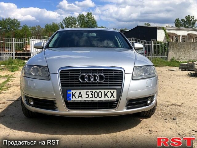 Серый Ауди А6, объемом двигателя 2.4 л и пробегом 135 тыс. км за 9300 $, фото 1 на Automoto.ua