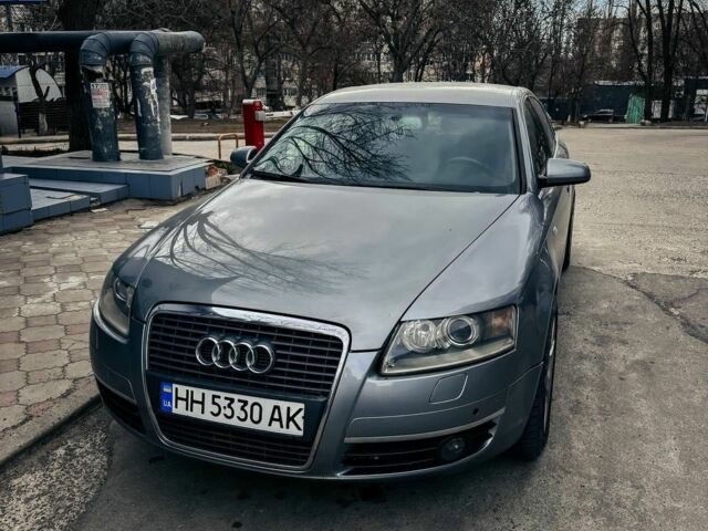 Серый Ауди А6, объемом двигателя 2 л и пробегом 318 тыс. км за 6500 $, фото 1 на Automoto.ua
