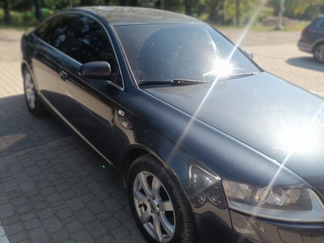 Сірий Ауді А6, об'ємом двигуна 2 л та пробігом 312 тис. км за 7000 $, фото 1 на Automoto.ua