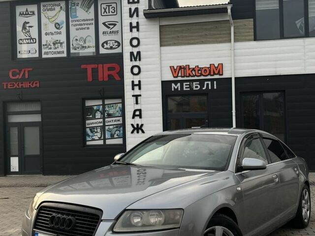 Серый Ауди А6, объемом двигателя 2 л и пробегом 245 тыс. км за 6199 $, фото 1 на Automoto.ua