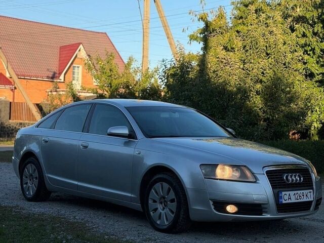 Серый Ауди А6, объемом двигателя 2 л и пробегом 310 тыс. км за 6000 $, фото 1 на Automoto.ua