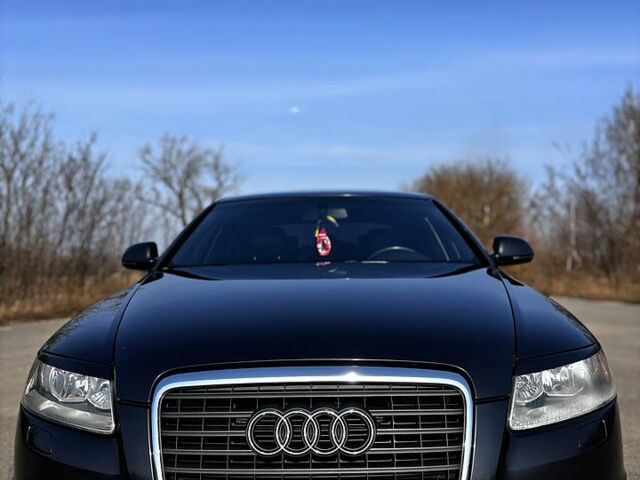 Серый Ауди А6, объемом двигателя 2 л и пробегом 295 тыс. км за 10000 $, фото 1 на Automoto.ua