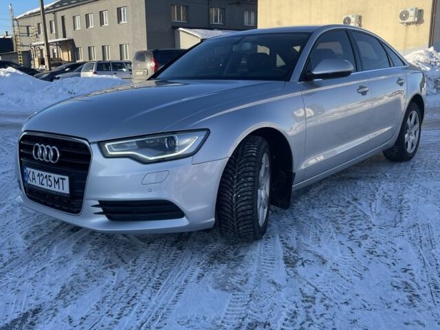 Сірий Ауді А6, об'ємом двигуна 2 л та пробігом 265 тис. км за 12999 $, фото 1 на Automoto.ua