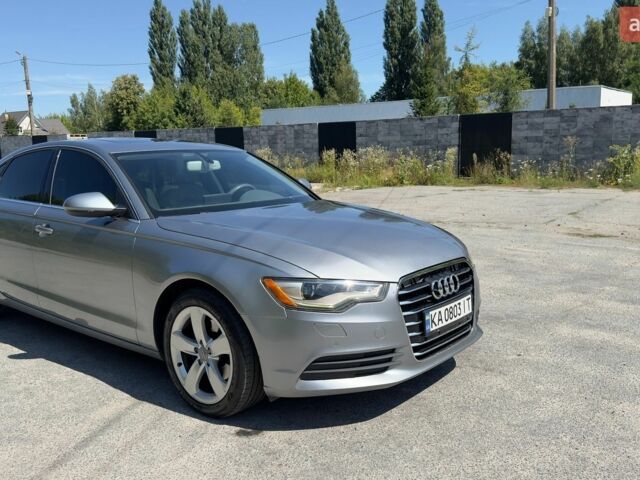 Сірий Ауді А6, об'ємом двигуна 1.98 л та пробігом 196 тис. км за 12200 $, фото 1 на Automoto.ua