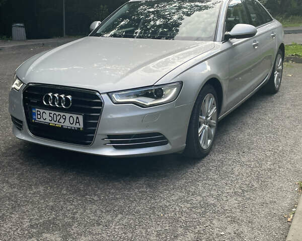 Серый Ауди А6, объемом двигателя 2 л и пробегом 170 тыс. км за 14800 $, фото 1 на Automoto.ua