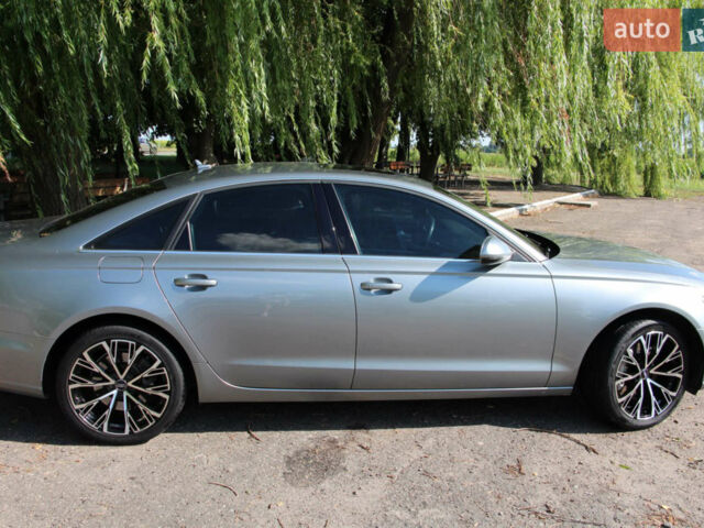 Сірий Ауді А6, об'ємом двигуна 2 л та пробігом 237 тис. км за 14000 $, фото 1 на Automoto.ua